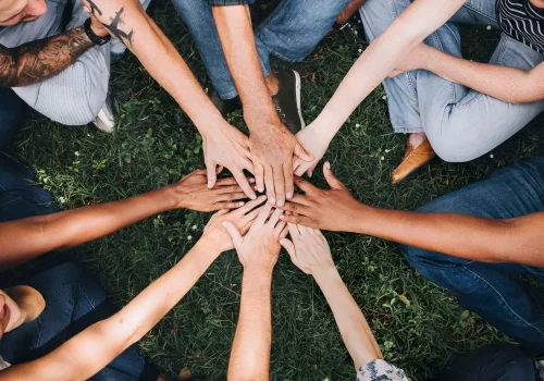 Friends hands together