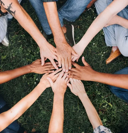 Friends hands together